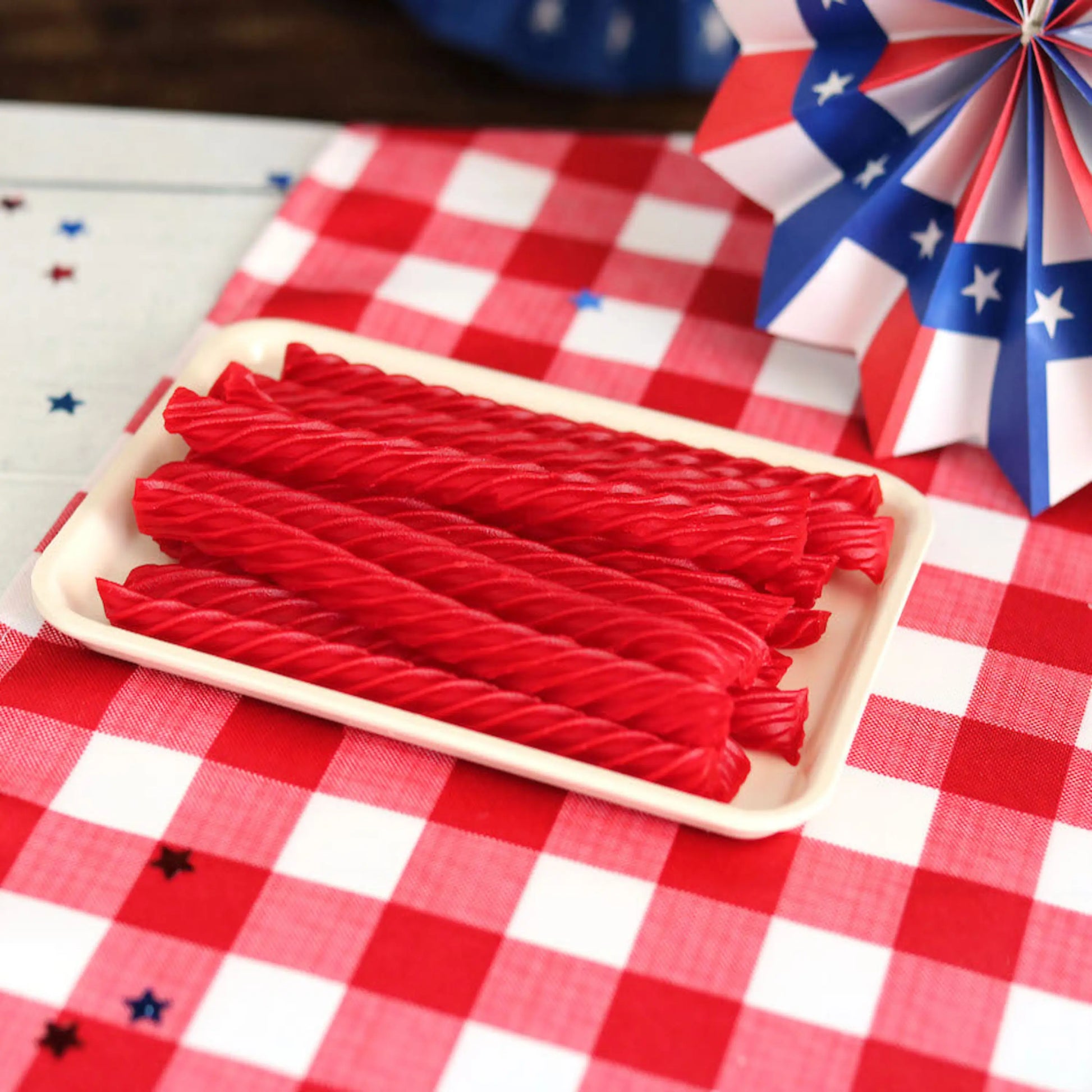 Red Vines Strawberry Licorice Twists, Sugar Free, on a picnic table with patriotic decorations