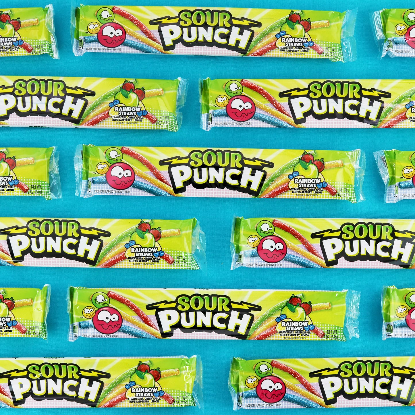 Sour Punch Rainbow Candy Straws 2oz Trays arranged horizontally on light blue background