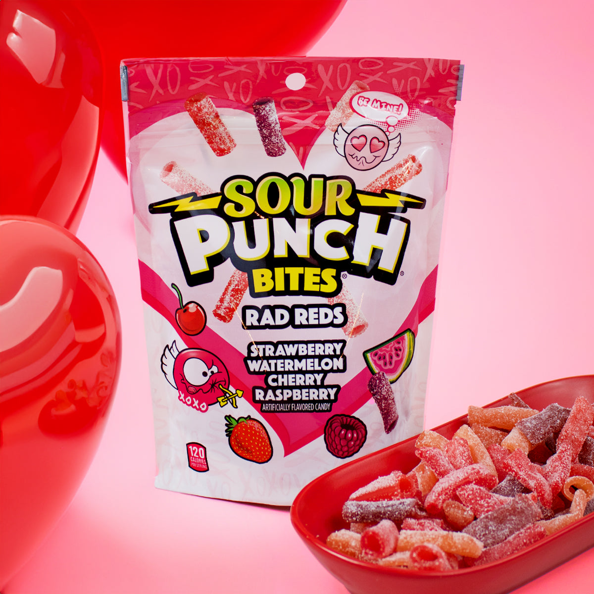 SOUR PUNCH Rad Reds Valentine's Day Candy Bites with red, heart-shaped balloons beside the bag