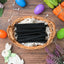 Red Vines Sugar Free Black Licorice Twists  in an Easter basket  surrounded by confetti and plastic eggs