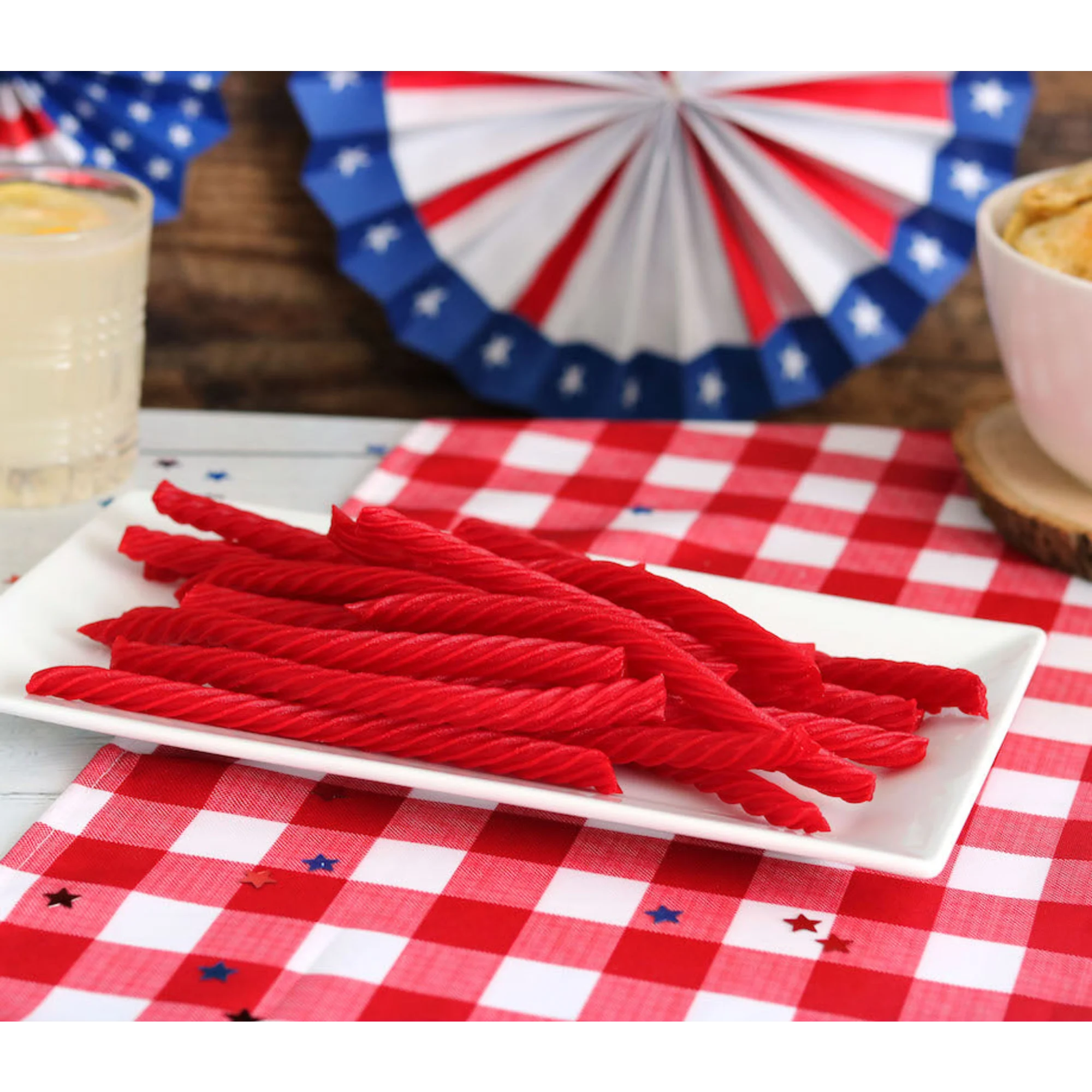 Red Vines Original Red Licorice Twists on a picnic table with patriotic decorations