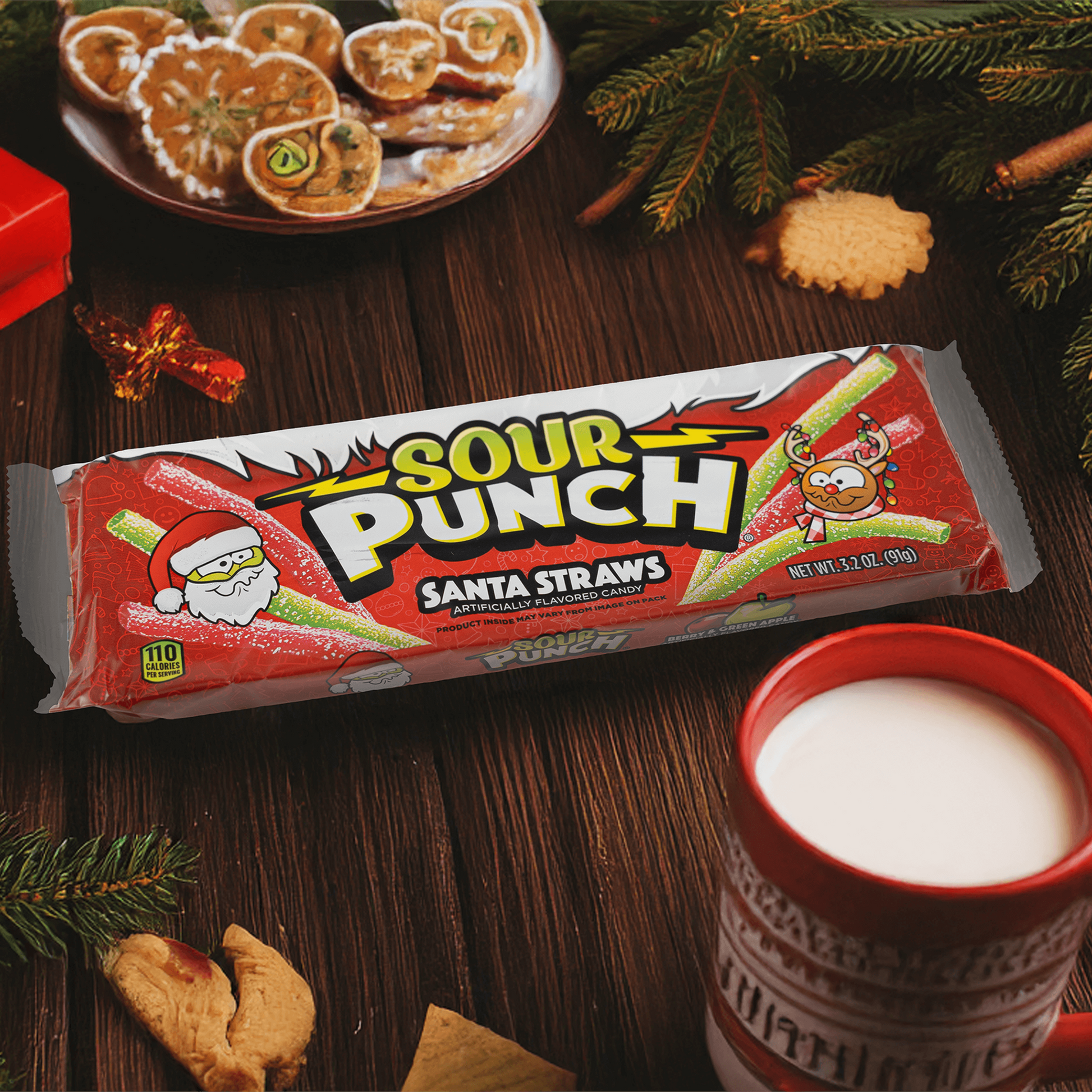 Sour Punch Santa Straws Candy Trays with Christmas cookies and milk