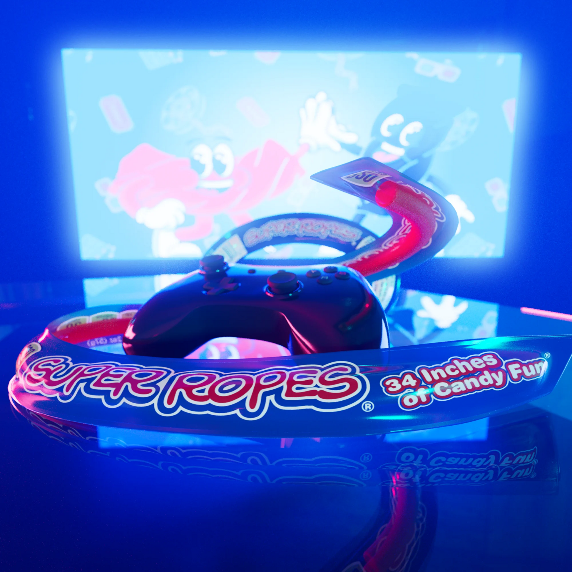 34-inch candy rope wrapped around a gaming controller with a glowing tv screen in the background