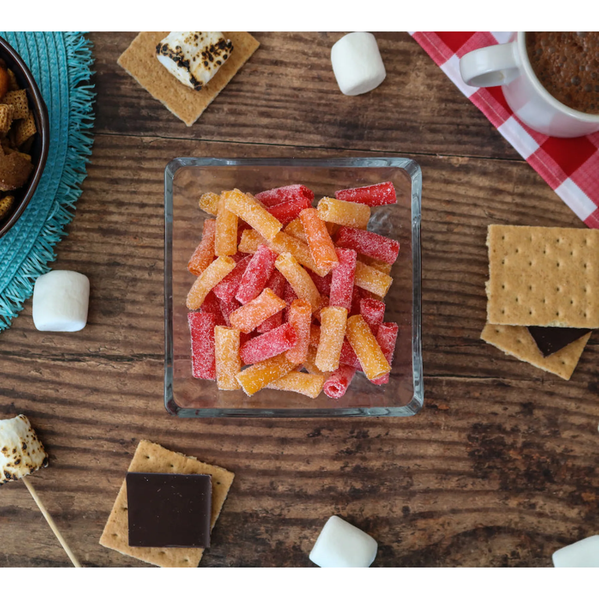 Sour Punch Bites Tropical Flavors alongside s'mores supplies