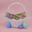 SOUR PUNCH Easter Candy Straws in a white Easter basket surrounded by plastic eggs