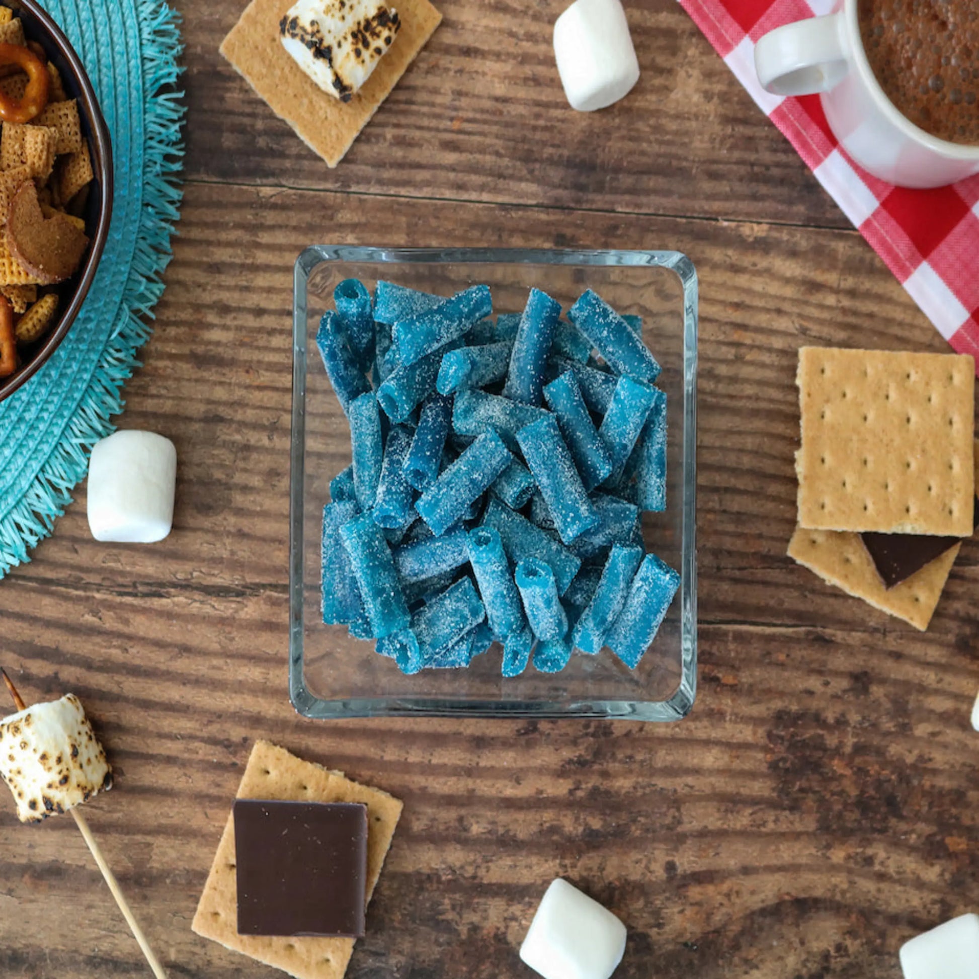 Sour Punch Bites Blue Raspberry Candy alongside s'mores supplies