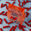 Red Vines Original Red Minis Bag surrounded by mini red licorice pieces