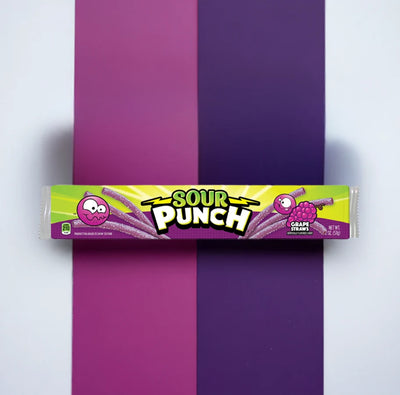 Sour Punch Grape Candy Straws 2oz Tray on a vertically split light purple and dark purple backgound