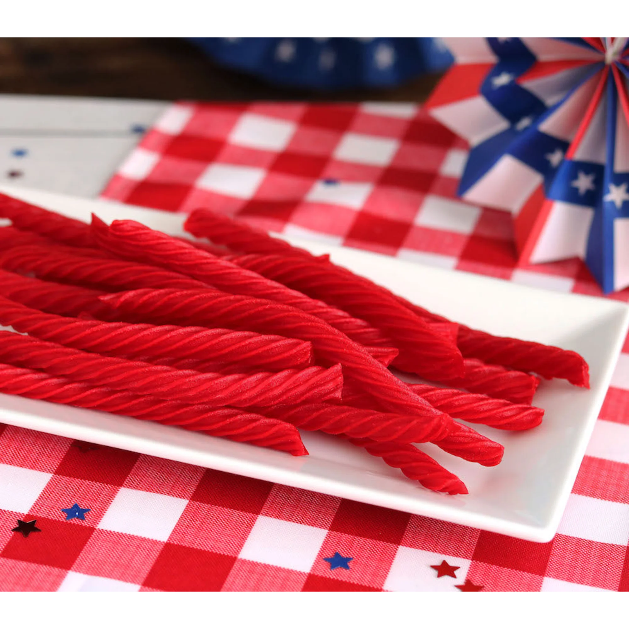 Red Vines Original Red Licorice Twists on a picnic table with patriotic decorations