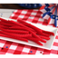 Red Vines Original Red Licorice Twists on a picnic table with patriotic decorations
