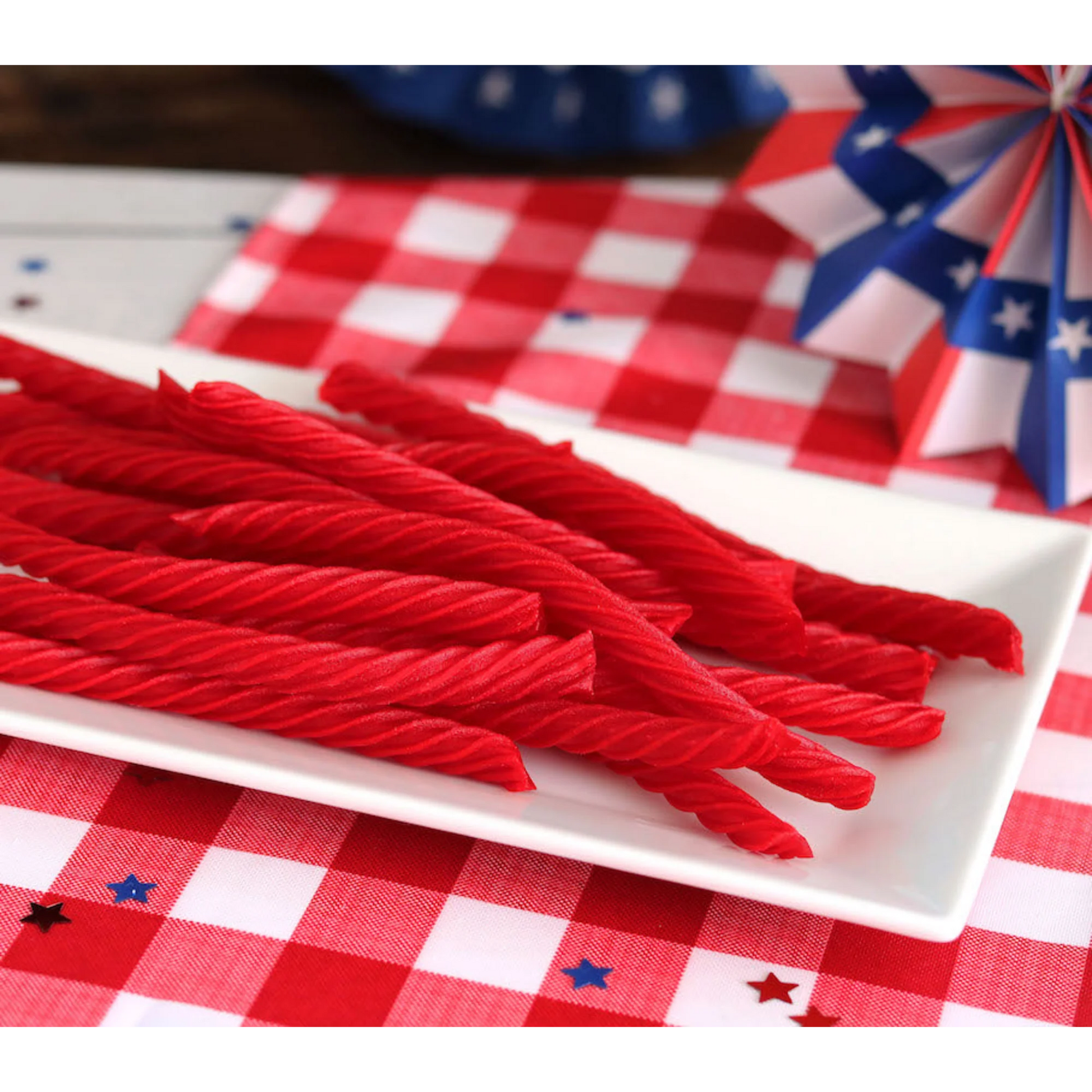 Red Vines Original Red Licorice Twists on a picnic table with patriotic decorations