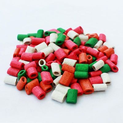 Original Snaps® Classic Chewy Candy, Pink, Orange, Green, and White Raw Candy pile