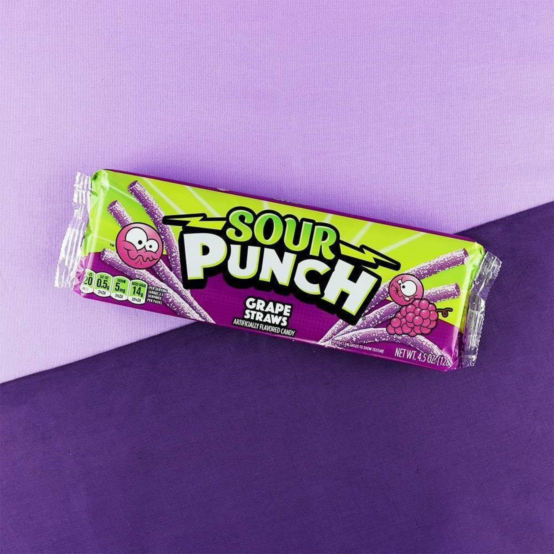Sour Punch Grape Candy Straws on Two Shades of Purple Background - Sour Punch Grape Straws