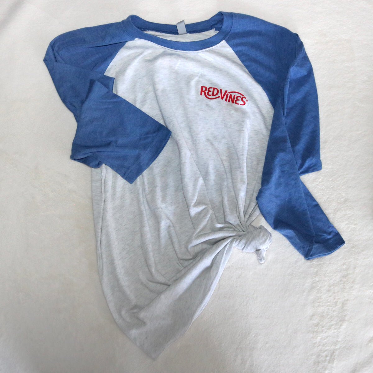 RED VINES Peace, Love & Vines T-Shirt with a knot tied in it