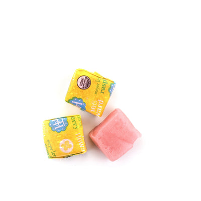 Chewie Fruities Meyer Lemon & Raspberry candy chews wrapped and unwrapped