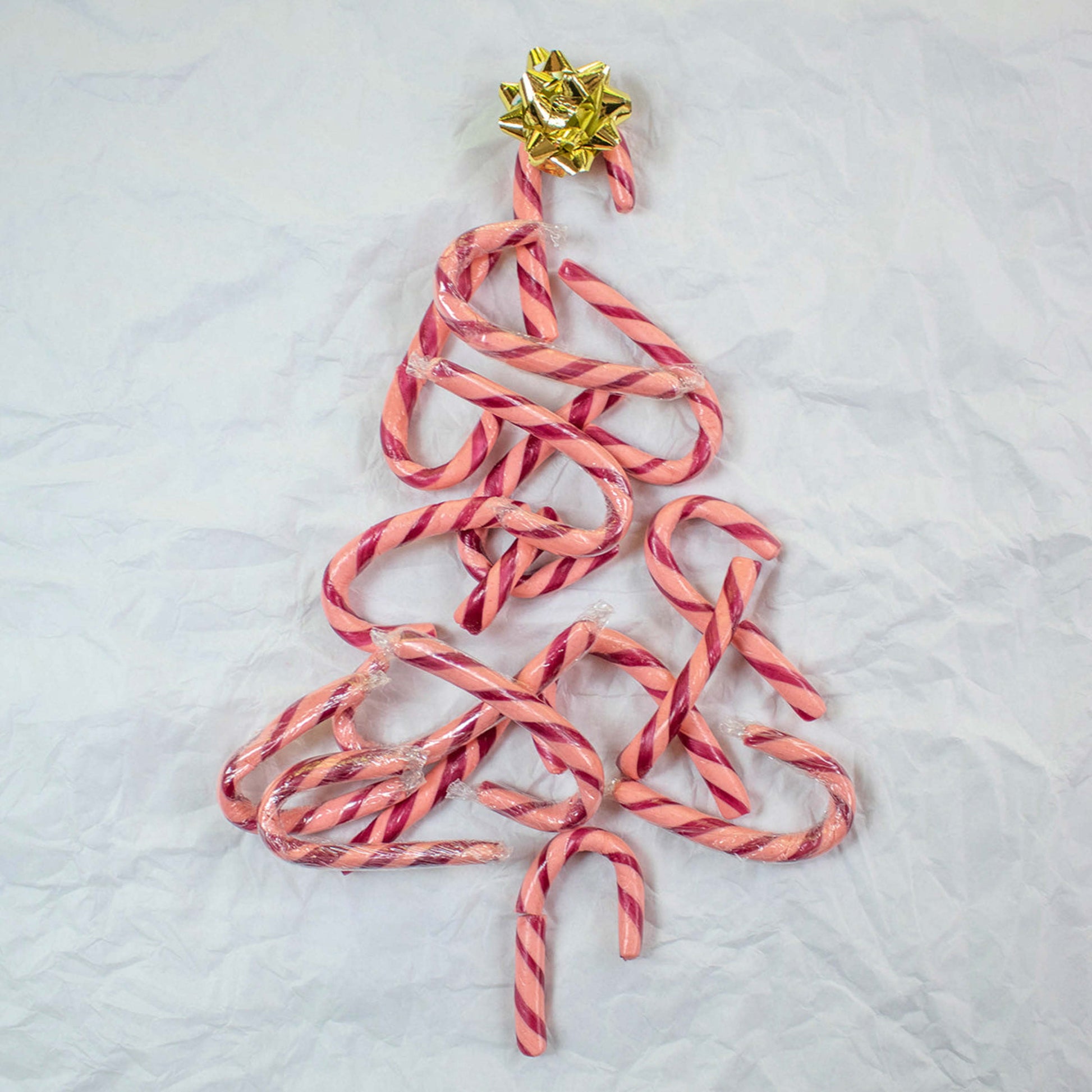 Torie & Howard Organic Mini Candy Canes in the shape of a Christmas tree